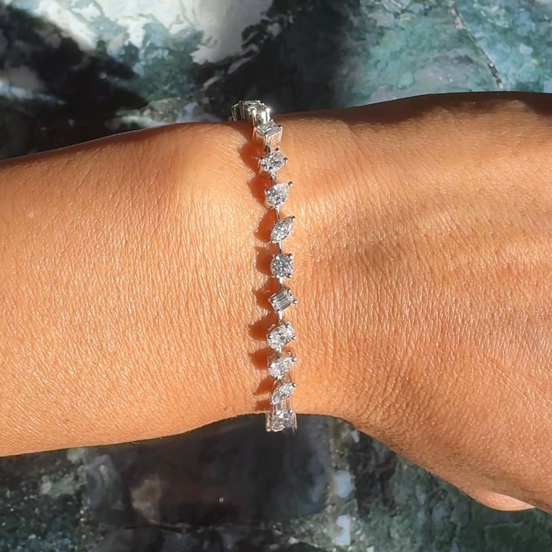 JULIETTE SPACED FANCY SHAPE TENNIS BRACELET